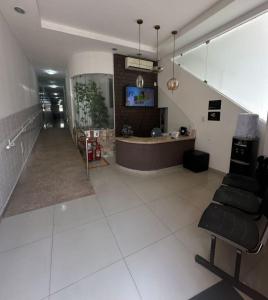 Μια τηλεόραση ή/και κέντρο ψυχαγωγίας στο Essenza Suites Natal