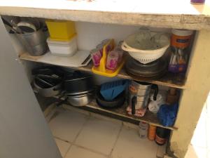 Η κουζίνα ή μικρή κουζίνα στο Aconchego Balbino hospedagem +3 φωτογραφίες