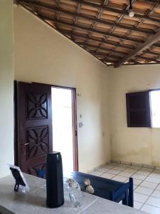 Μια τηλεόραση ή/και κέντρο ψυχαγωγίας στο Aconchego Balbino hospedagem