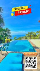 een zwembad in een resort met de tekst speciale promotie bij SeaView Villa Tropicana in Salad Beach