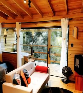 Posezení v ubytování Cabana na Serra da Cantareira com Hidro