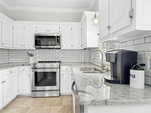 Køkken eller tekøkken på Southern City Living