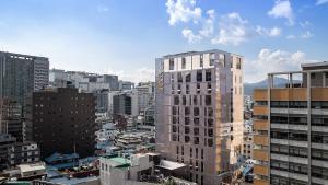 a view of a city with tall buildings at Stayrak Hotel in Seoul