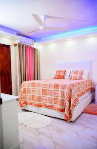 Ένα ή περισσότερα κρεβάτια σε δωμάτιο στο Apartamento en el malecón cerca de la playa