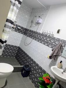 a bathroom with a shower and a toilet and a sink at ESTANCIA don VICTOR  +41 photos