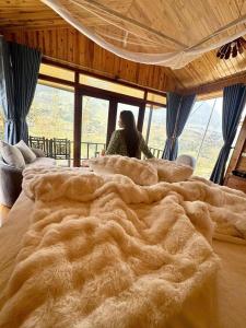 Postel nebo postele na pokoji v ubytování Hmong House - Sapa Retreat