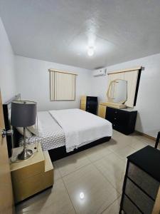 Postel nebo postele na pokoji v ubytování Peaceful 1 bedroom, 1 bathroom at Joe's Place