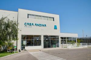 a large white building with a sign on it at Casa Andina Select Paracas in Paracas
