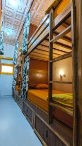 Ένα ή περισσότερα κρεβάτια σε δωμάτιο στο Casa de Vie Hostel +84 φωτογραφίες