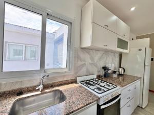 Kuchyň nebo kuchyňský kout v ubytování Olavarria suite