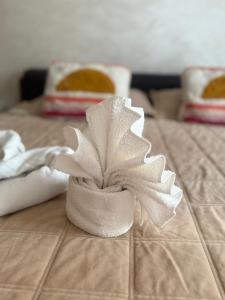 a paper plant sitting on top of a table at Spacious Appartment in the heart of Tangier with 2 living rooms, 2 bedrooms KING SIZE beds, 2 baths, 2 patios in Tangier