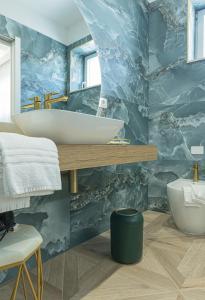 Koupelna v ubytování boutique teatro b&b + 39 fotografií