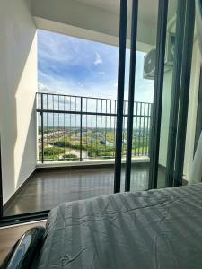 Ένα ή περισσότερα κρεβάτια σε δωμάτιο στο MT Eastmark city serviced room-apartment