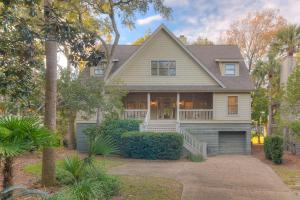 a house with a porch and a tree at SM04: 4 Silver Moss in Kiawah Island