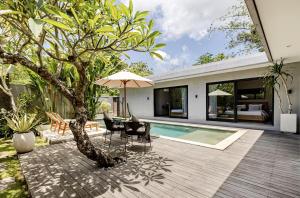 Swimmingpoolen hos eller tæt på Optima Villas Bingin