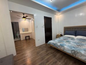 Postel nebo postele na pokoji v ubytování Manatad Transient House