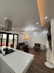 TV a/nebo společenská místnost v ubytování Manatad Transient House