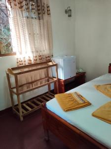 Postel nebo postele na pokoji v ubytování Ella Summer Leisure