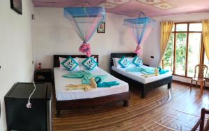 Krevet ili kreveti u jedinici u okviru objekta Ella Summer Leisure