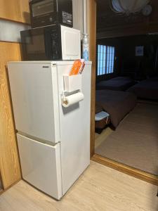 Kuchyň nebo kuchyňský kout v ubytování Guest House "Ro"Ikura