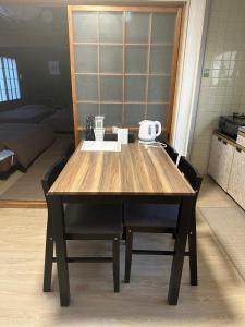 Příslušenství pro přípravu čaje a kávy v ubytování Guest House "Ro"Ikura + 6 fotografií