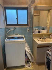 Kuchyň nebo kuchyňský kout v ubytování Guest House "Ro"Ikura