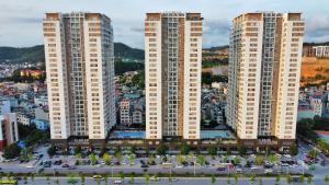 an aerial view of tall buildings in a city at Garden Apartment Halong in Ha Long