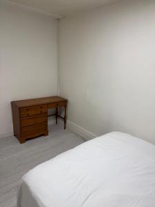 Ένα ή περισσότερα κρεβάτια σε δωμάτιο στο Awesome Apartment in downtown London