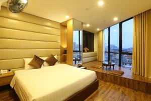 Postel nebo postele na pokoji v ubytování Au Viet Hotel + 25 fotografií