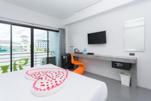TV a/nebo společenská místnost v ubytování Riverside Hotel