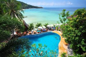 an aerial view of a resort with a swimming pool and the ocean at Haad Yao Bayview in Koh Phangan