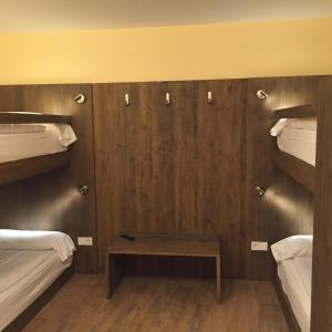 Hotel L’Ermita B&B客房内的一张或多张床位