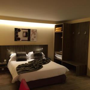 Hotel L’Ermita B&B客房内的一张或多张床位
