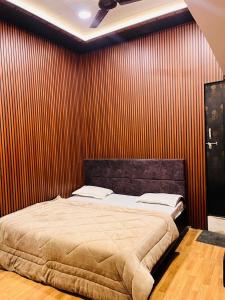 Ένα ή περισσότερα κρεβάτια σε δωμάτιο στο Pallav Guest House