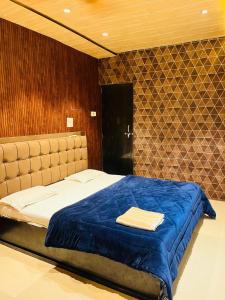 Ένα ή περισσότερα κρεβάτια σε δωμάτιο στο Pallav Guest House +8 φωτογραφίες