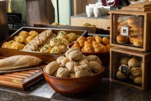 a bakery with various types of bread and pastries at Butterfly Valley Resort by Cosmos Oasis in Ruisui