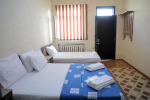 Katil atau katil-katil dalam bilik di SAFAR hotel