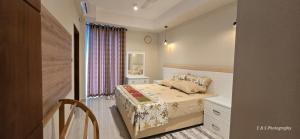 a small bedroom with a bed and a window at Chilax By The Ocean in Dehiwala +23 photos