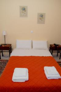 A bed or beds in a room at Nefeli