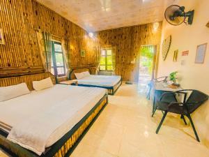 Postel nebo postele na pokoji v ubytování Trang An Quynh Trang Happy Homestay & Garden + 109 fotografií