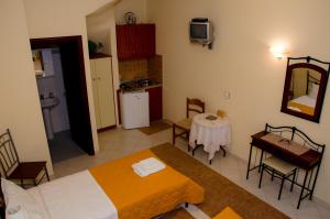 A bed or beds in a room at Nefeli