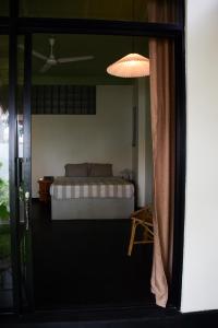 Ένα ή περισσότερα κρεβάτια σε δωμάτιο στο Nova Surf House