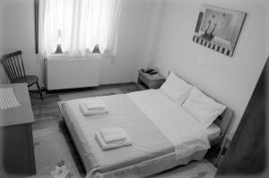 A bed or beds in a room at Nefeli