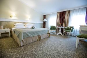 Кровать или кровати в номере Чехов Отель сети Оригинальные Отели