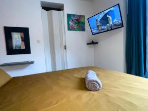 Ένα ή περισσότερα κρεβάτια σε δωμάτιο στο La suite Maud