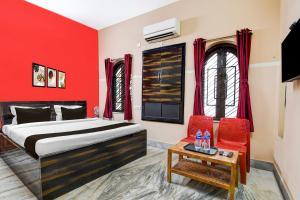 Postel nebo postele na pokoji v ubytování Super Hotel O NSCB International Airport Formerly Bougain Villa