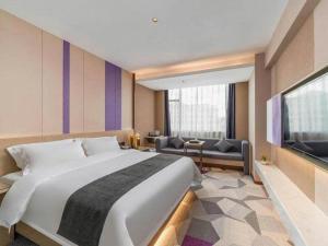 Postel nebo postele na pokoji v ubytování Lavande Hotel Chaozhou Fortune Center Lin Street + 181 fotografií