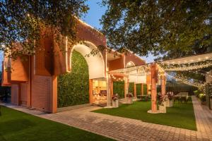 Zahrada ubytování Mango Grove Hotel