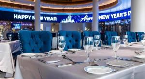 a table with wine glasses and napkins on it at Ahern Hotel and Event Center in Las Vegas +145 photos