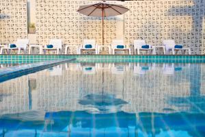 Πισίνα στο ή κοντά στο Fourium Pattaya Hotel and Serviced Residence +25 φωτογραφίες